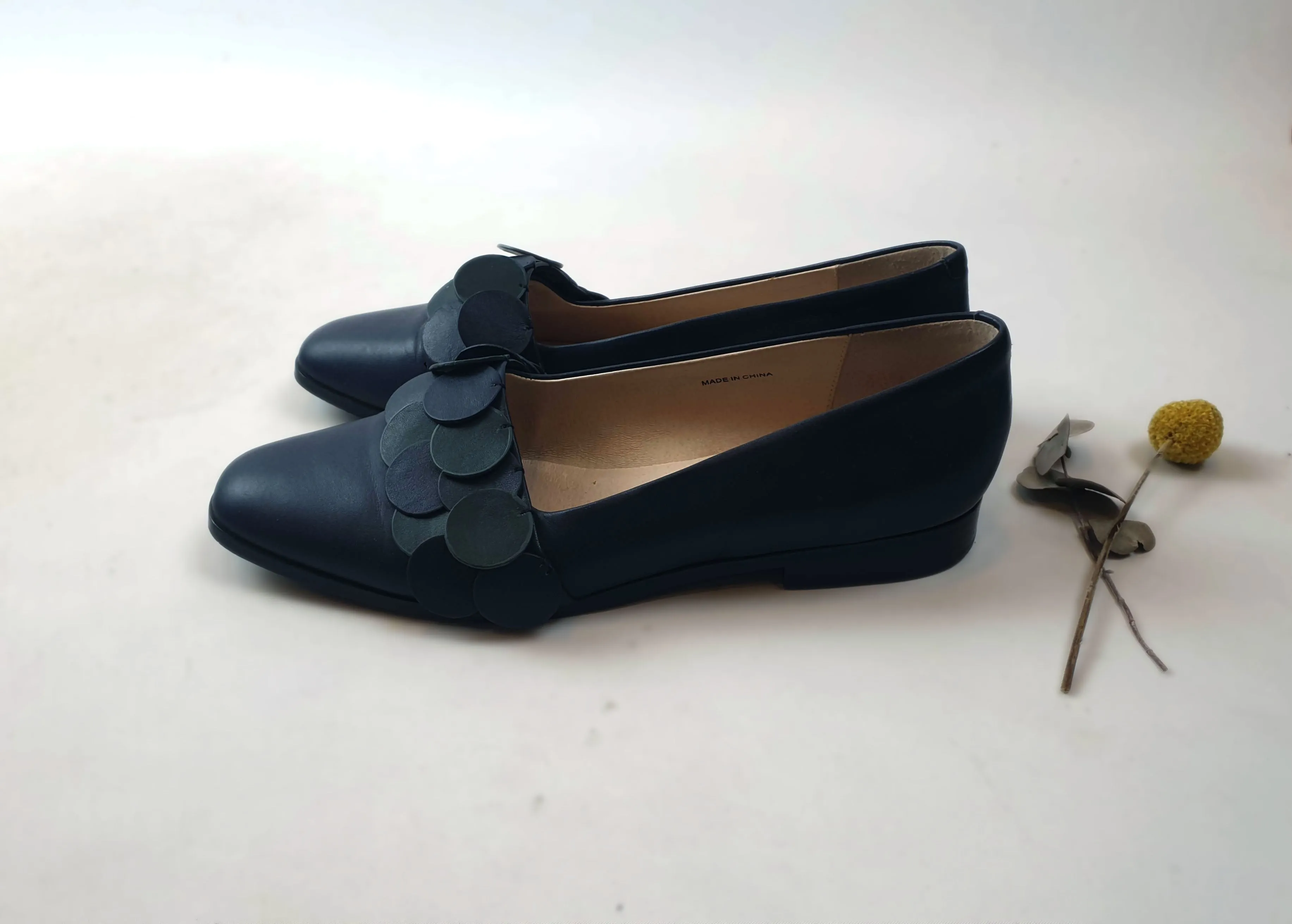 Alpha 60 navy shoes wiith unique front circle detail size 40