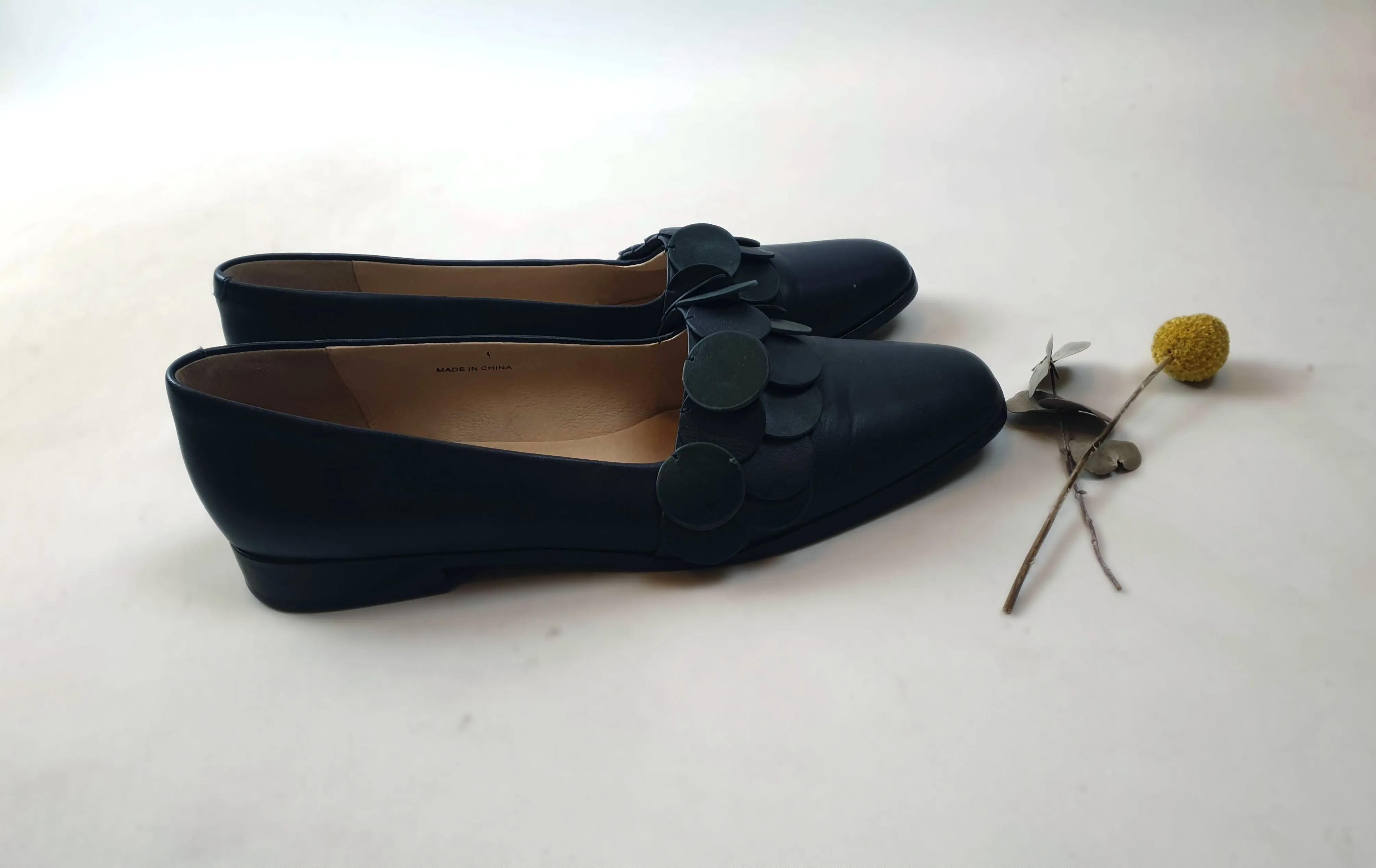 Alpha 60 navy shoes wiith unique front circle detail size 40