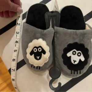 The CUTEST, coziest comfy slipper for your little! 1 white sheep/1 black sheep🐑
